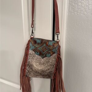 Oklahoma made crossbody.  Stadium size.